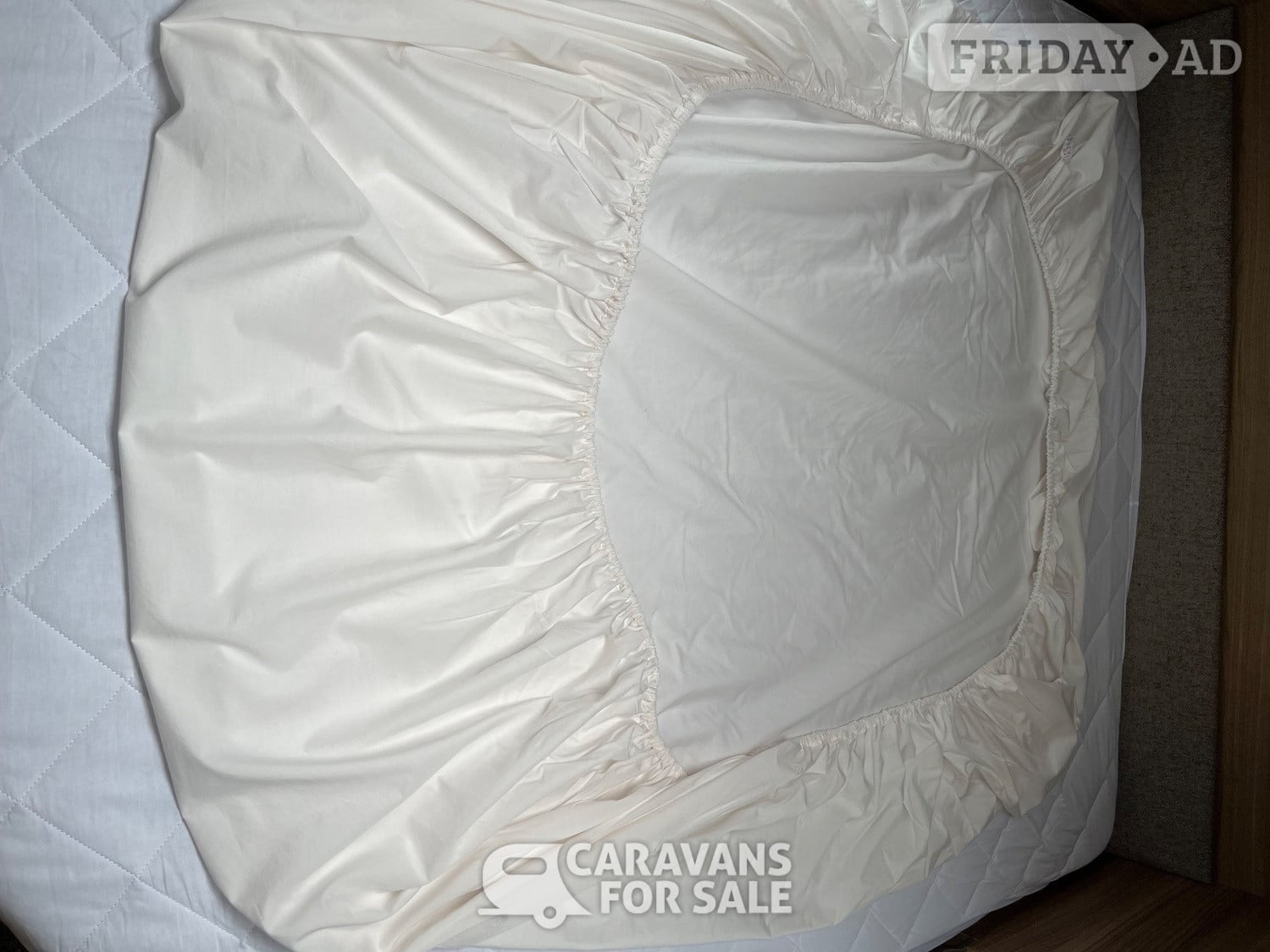 Tuck Me Under Island bed quilt and bedding