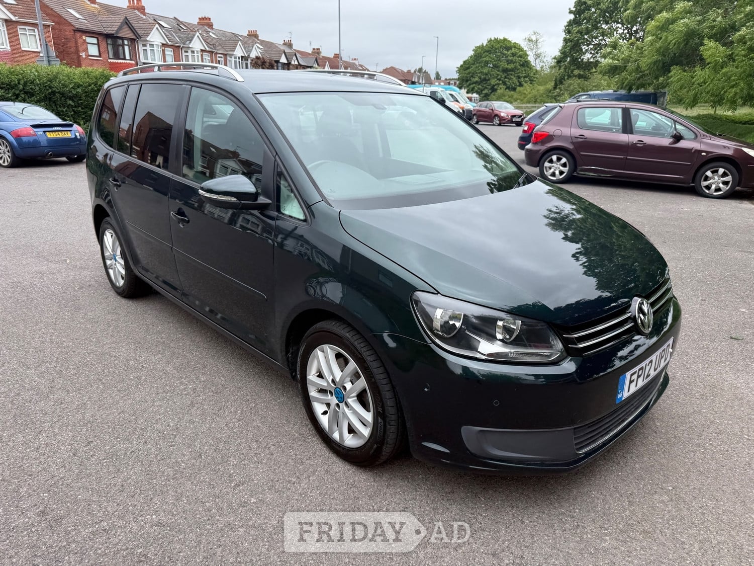 Volkswagen Touran 2012 - Cars