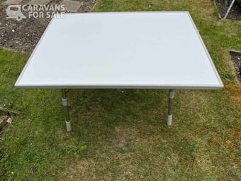 Adjustable white table