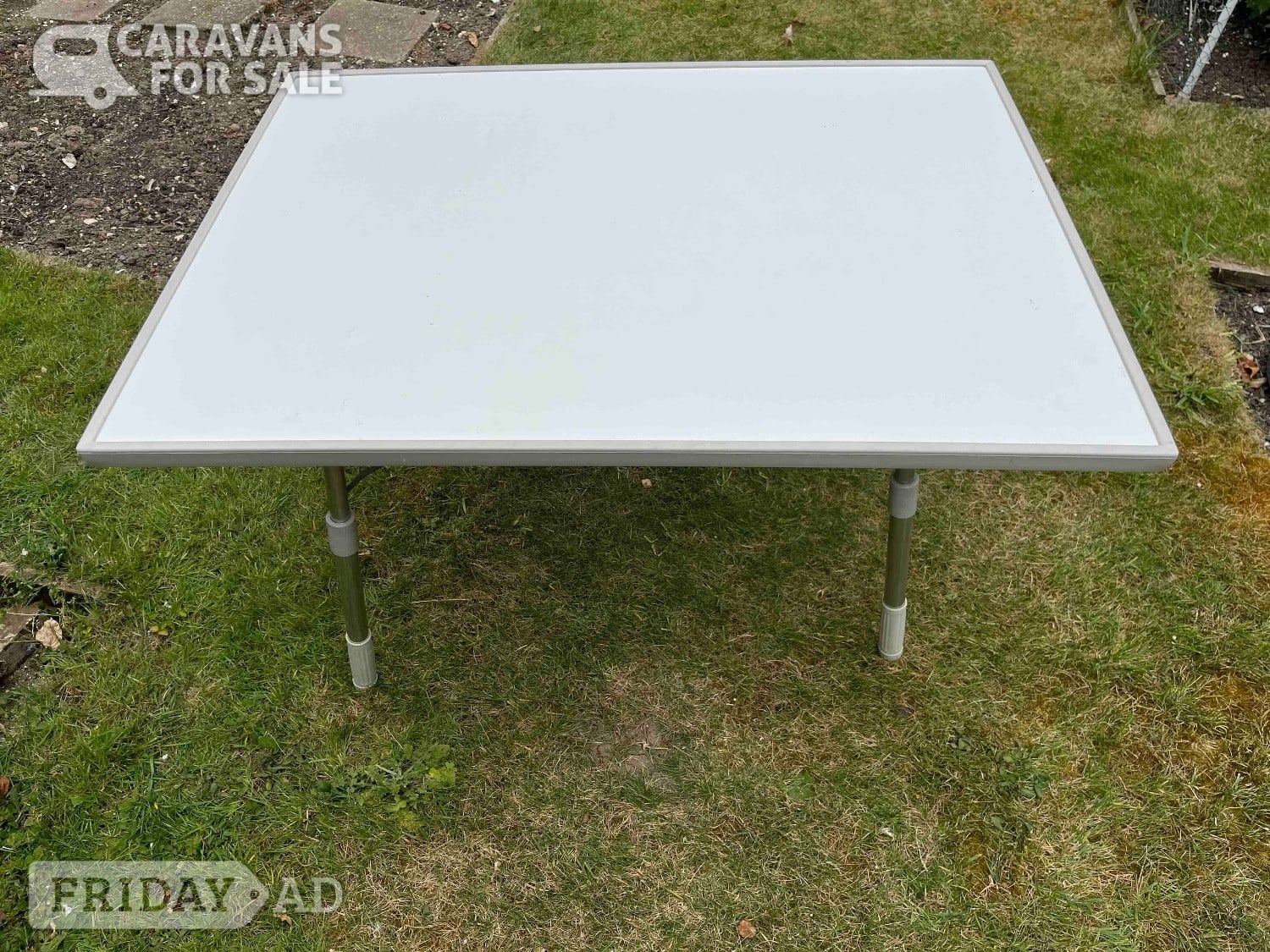 Adjustable white table in Winchester