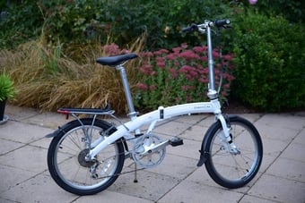 Two Dahon mu P8 Folding Bicycles