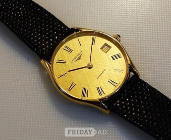 Longines gentlemans 9ct solid gold wristwatch.