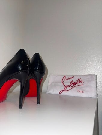 Brand new christian lambouni black heels 