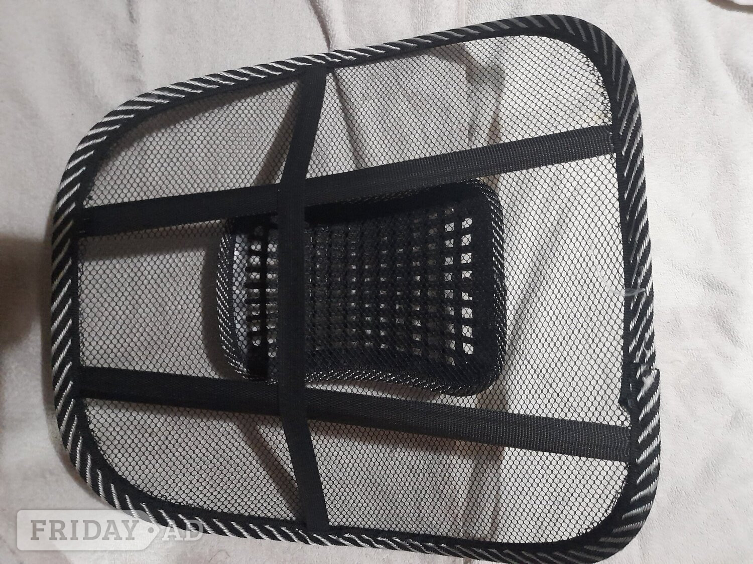 Back Support for a Car seat or any other similar seat.