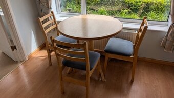 Light wood colour small dining table & 3 chairs with padded seats