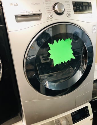 LG silver colour washing machine 8KG sized works perfectly 