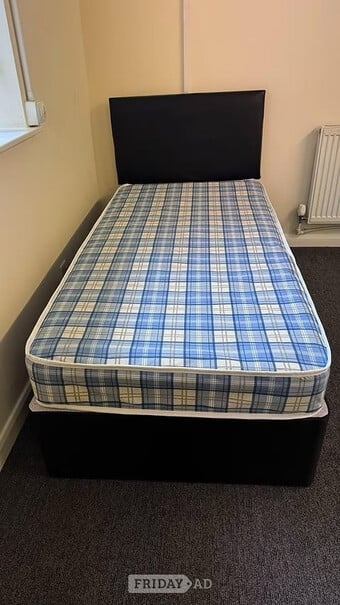 Single - Economy mattress with black divan base and headboard