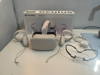 Oculus Quest 2 (includes elite strap)pristine. Used 4 times only