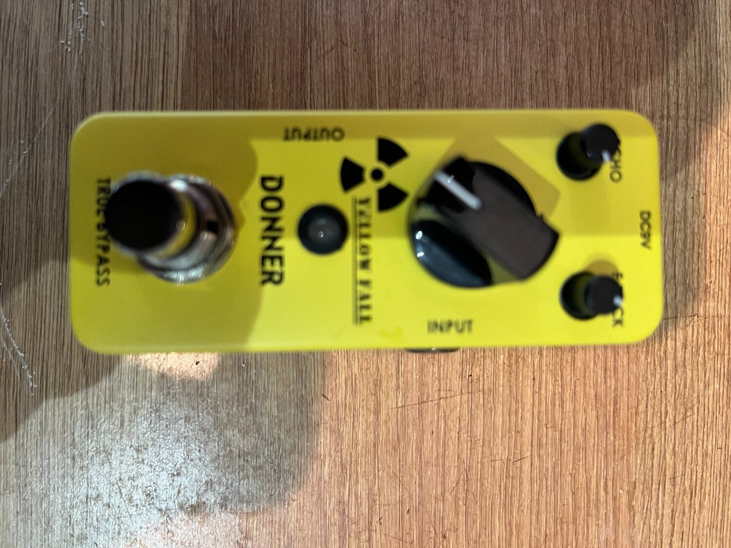 Delay pedal, echo pedal, distortion pedal, wah pedal.