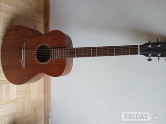Guitar. Vintage brand acoustic. Two years old barely used 