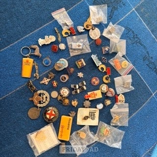 50 + enamal badges in Worthing
