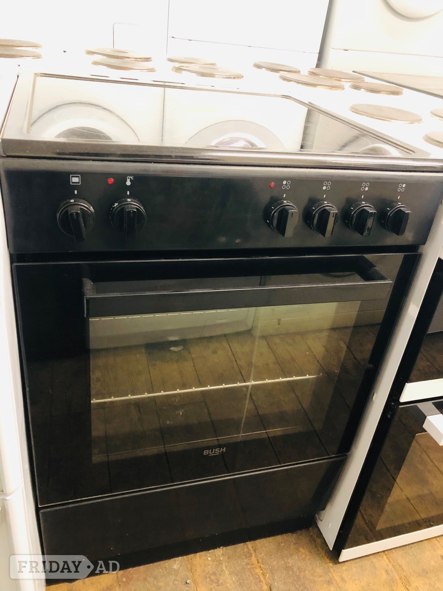 Black bush 60CM Wide Electric cooker with top oven and grill. in Corby