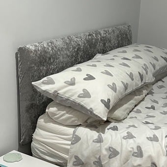 Double grey upholstered headboard 