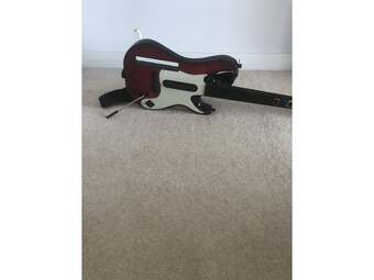 Nintendo Wii wireless Guitar Band Hero. Reduced.