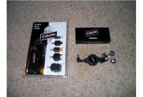PORTABLE MOBILE PHONE CHARGER AND EARPHONES.