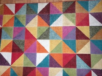 Multi coloured large floor rug