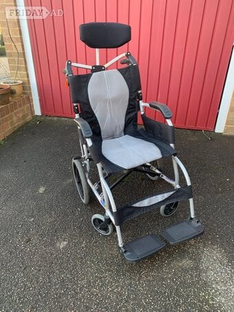 Wheelchairs with headrest