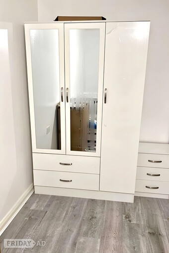 Three door wardrobe with mirror and drawers for sale 
