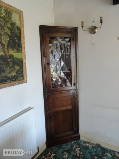 Tall corner display cabinet, dark oak with glazed door in Lancing