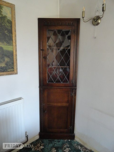 Tall corner display cabinet, dark oak with glazed door