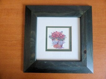 Three stained wood frames