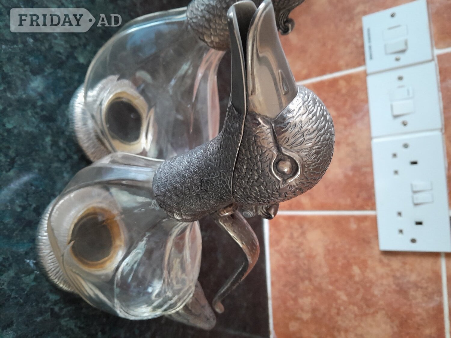 Bexhill-On-Sea Vintage pair of duck Decanters, silver plated