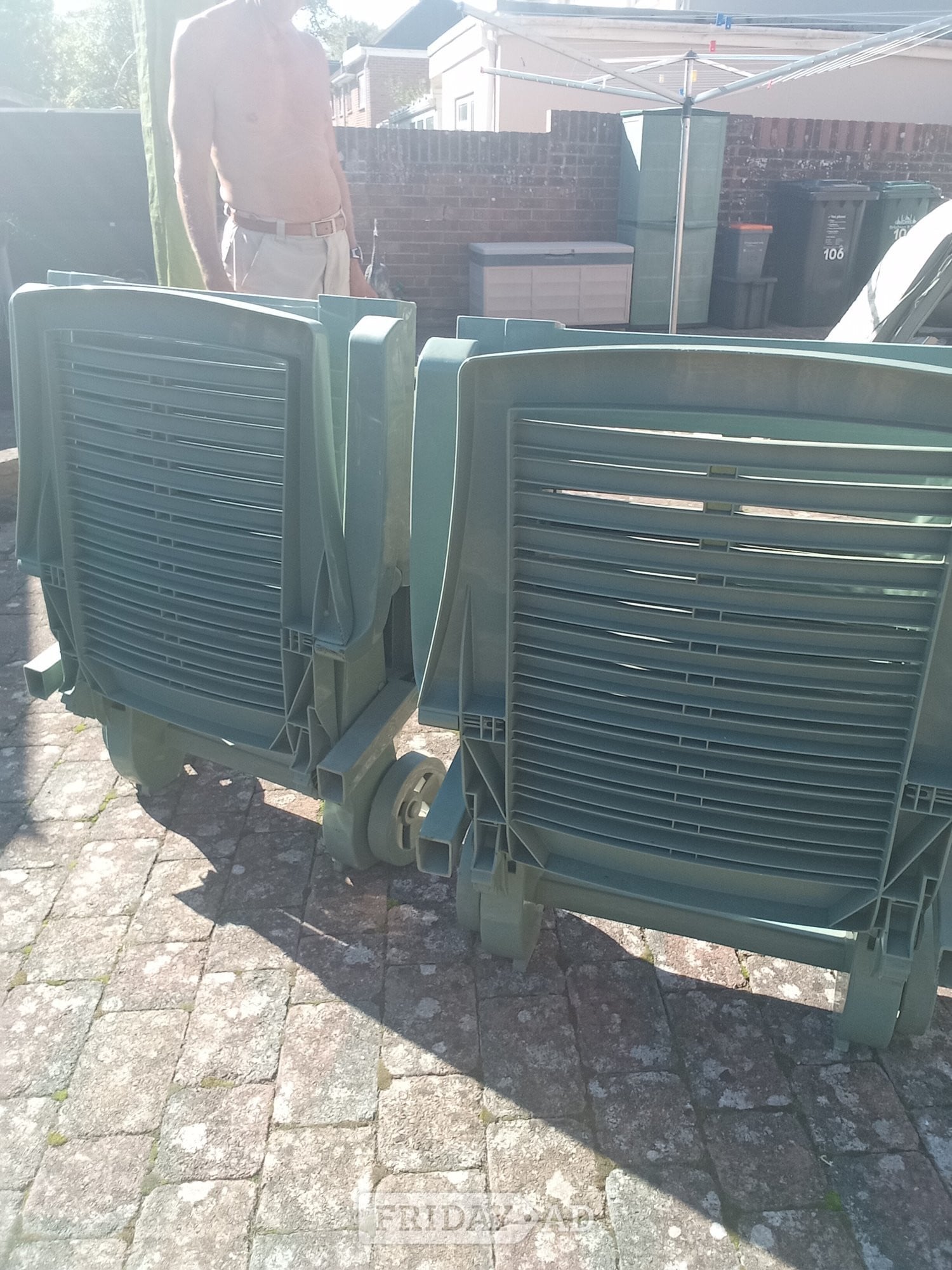 Two sunbeds with cushions and table in Brighton