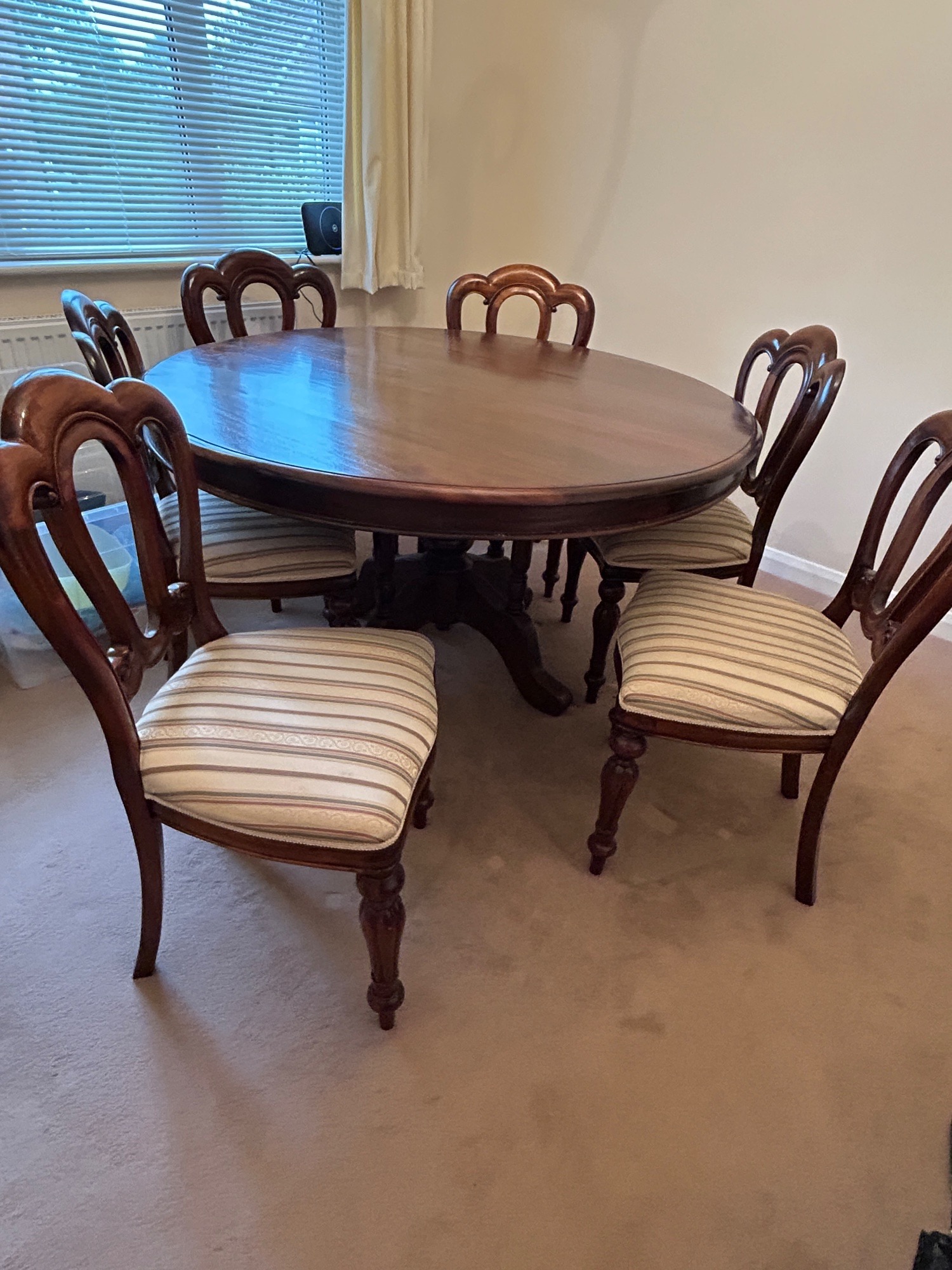Mahogany round dining room table with 6 matching chairs. - Furniture in Haywards Heath