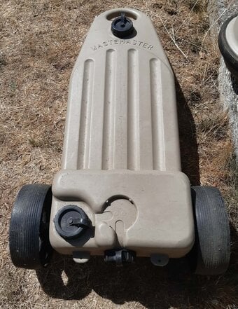 WASTEMASTER WASTE COLLECTER FOR CARAVAN ON WHEELS. USED GOOD COND