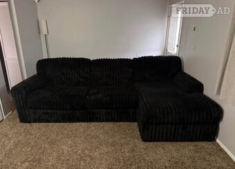 All black plush teddy bear fur sofa with lounge