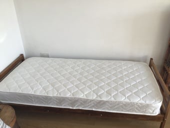 Bed mattress- never used (memory foam and spring combo)