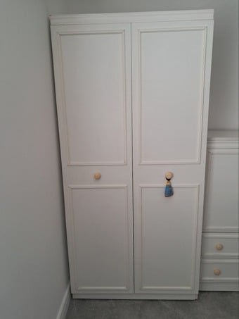 Double wardrobe with shelf