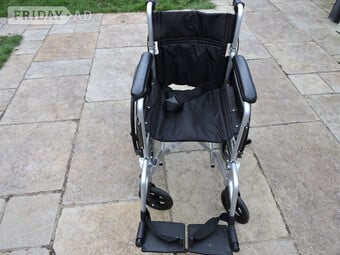 KARMA lightweight wheelchair .with poncho and cushion 