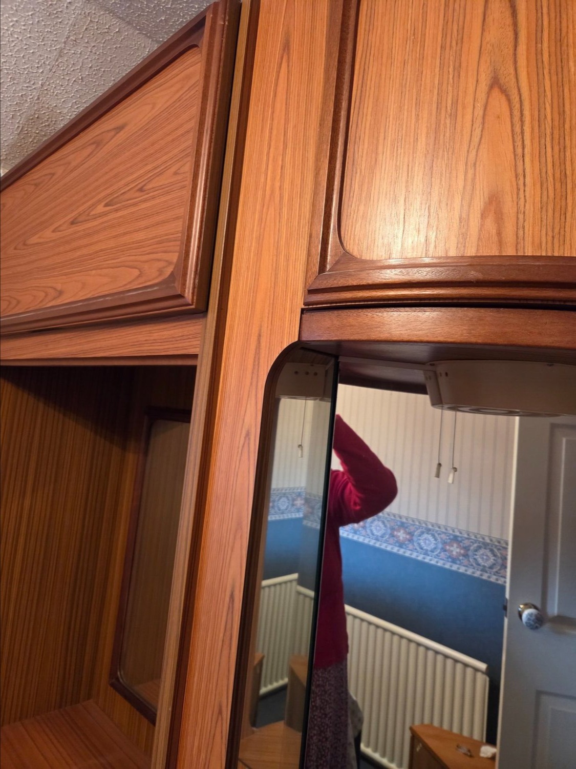 Llantwit Major  curved corner unit with 3  integrated mirrors and drawer