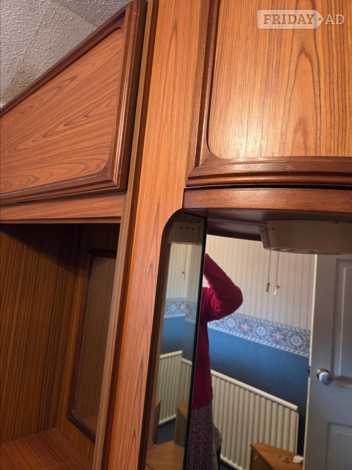 Llantwit Major  curved corner unit with 3  integrated mirrors and drawer