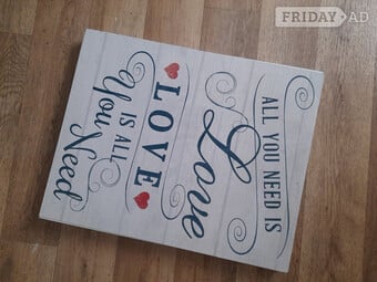 Wood framed 'love is all..' quote