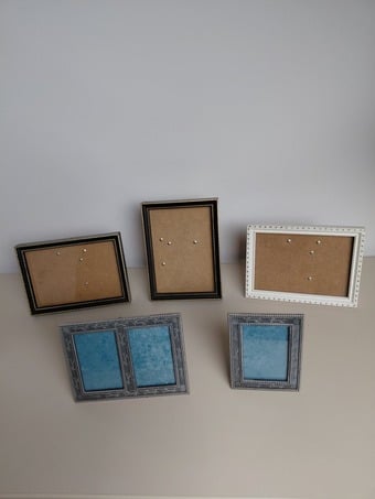 An Assortment of Small Photo Frames
