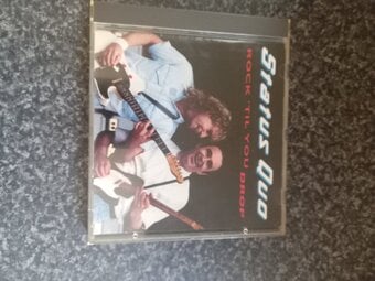 "ROCK 'TIL YOU DROP " STATUS QUO CD  (SIGNED COPY)