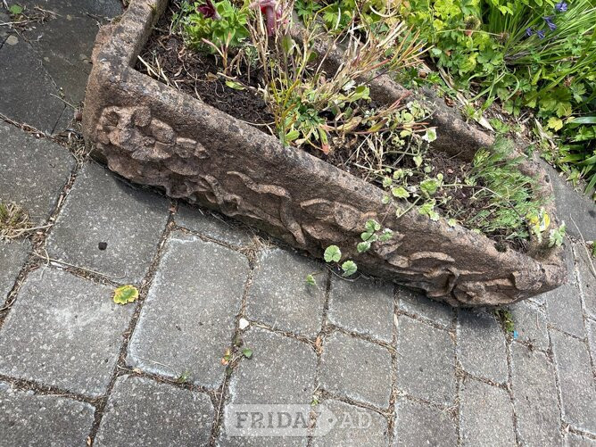 three antique planters