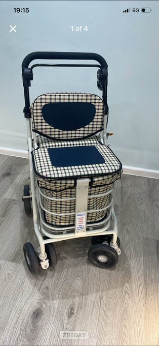 Prestige sit on Walker shopping trolly