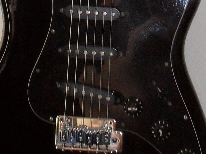 Stratocaster Guitar. EPIPHONE STRAT in BLACK.  Good working order and few are for sale