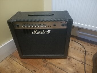 Ibanez guitar with effects pedal and Marshall amplifier 