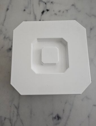 White plastic ice bucket.