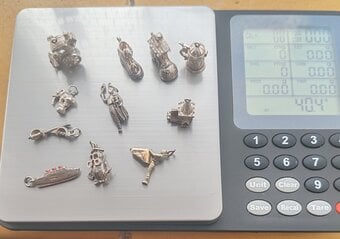 Job lot of 11 silver charms 