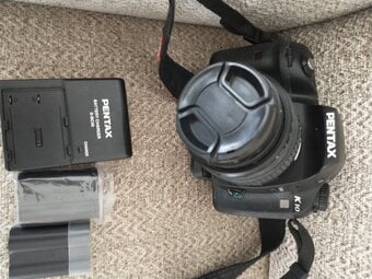 Pentax camera with case.