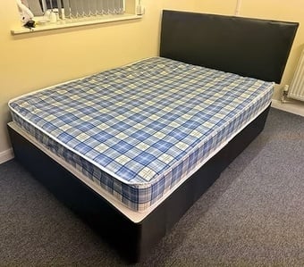 4 Foot Economy Mattress with black divan base and headboard