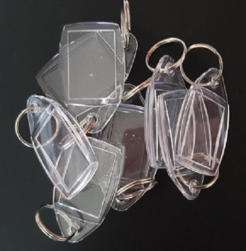 Sheffield 71 2 part clear plastic keyring blanks with metal loop   71 clear plastic keyring blanks in 2 parts with metal loop. Picture holder and snap fit top 