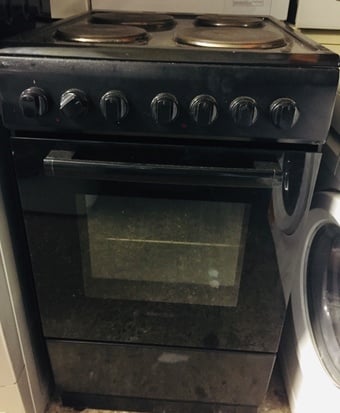 Black solid Top electric cooker 50CM wide with Top oven & grill.