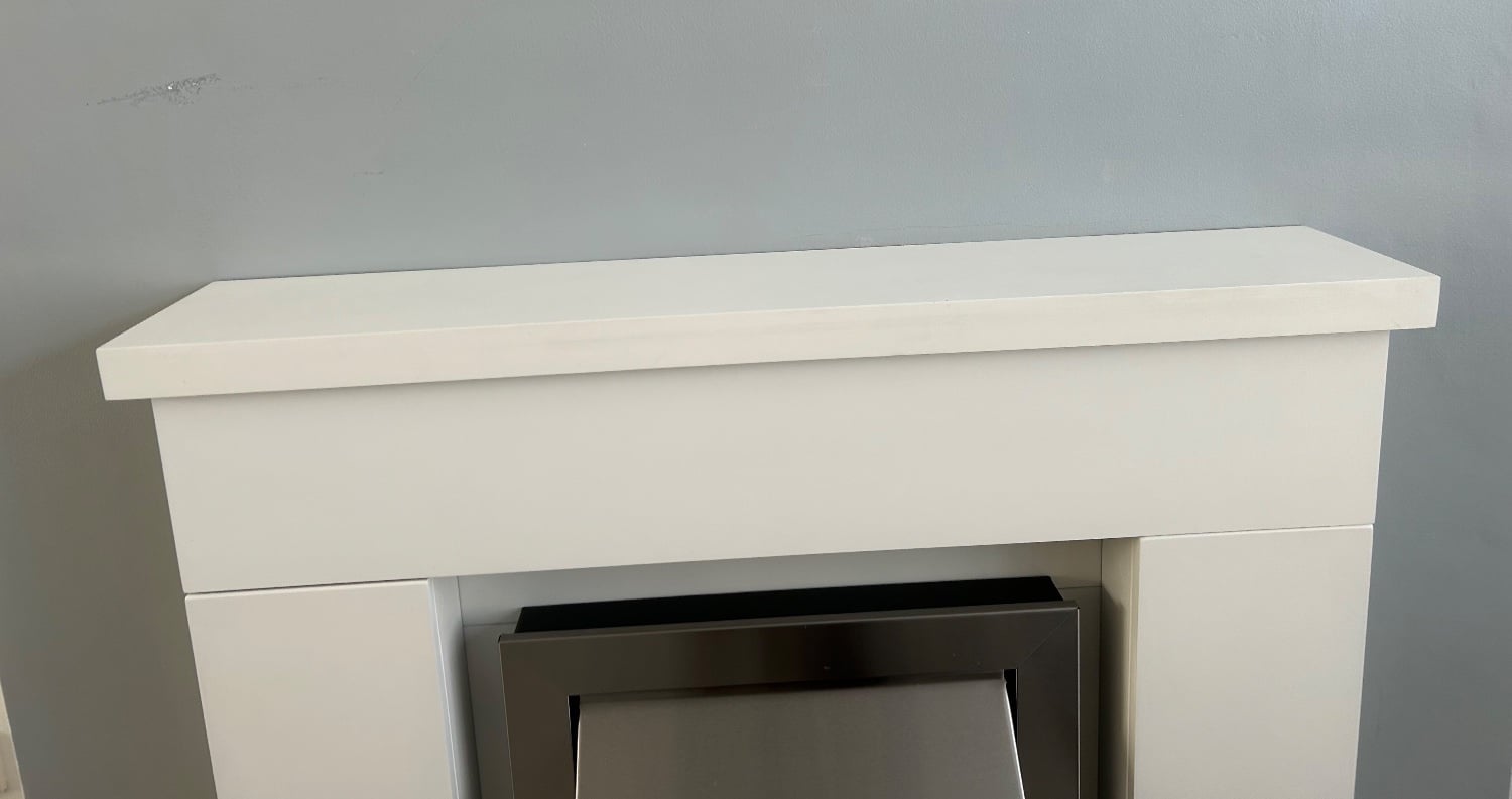 Chichester Electric fire with ornamental surround 