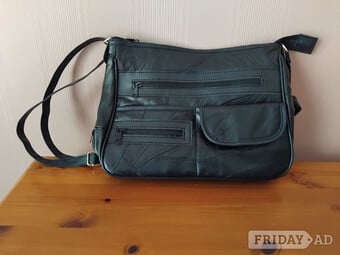 Brand new black leather handbag.
